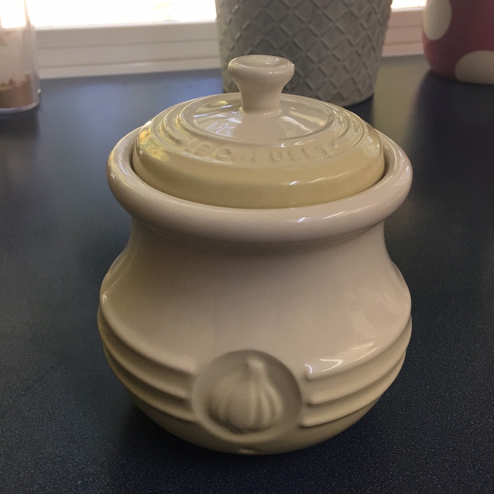 Le Creuset garlic keeper.